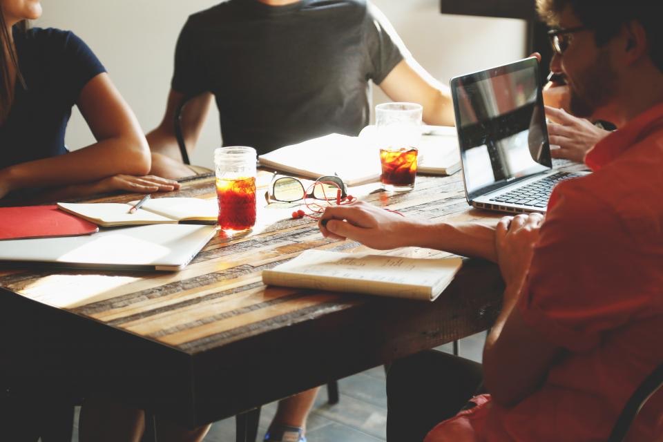 A small team working together at a table
